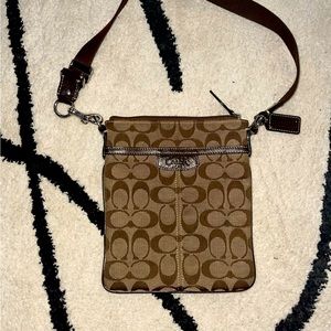 Coach signature crossbody bag.